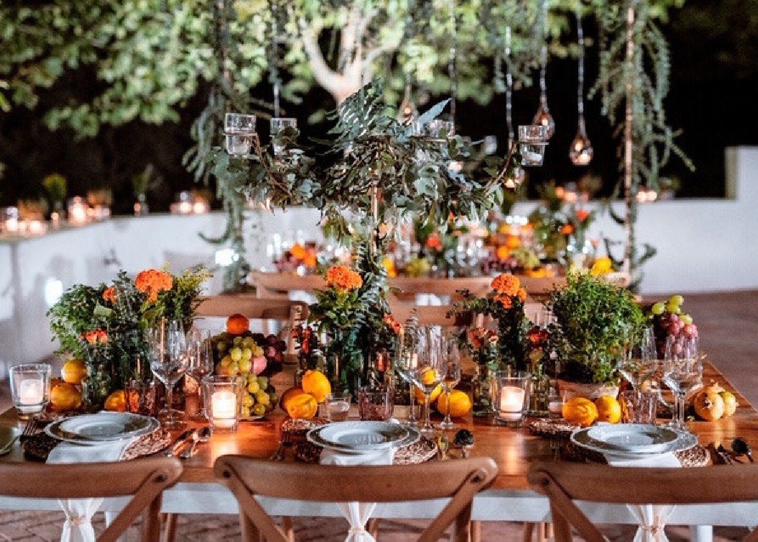 Table decorated with fruit and flowers