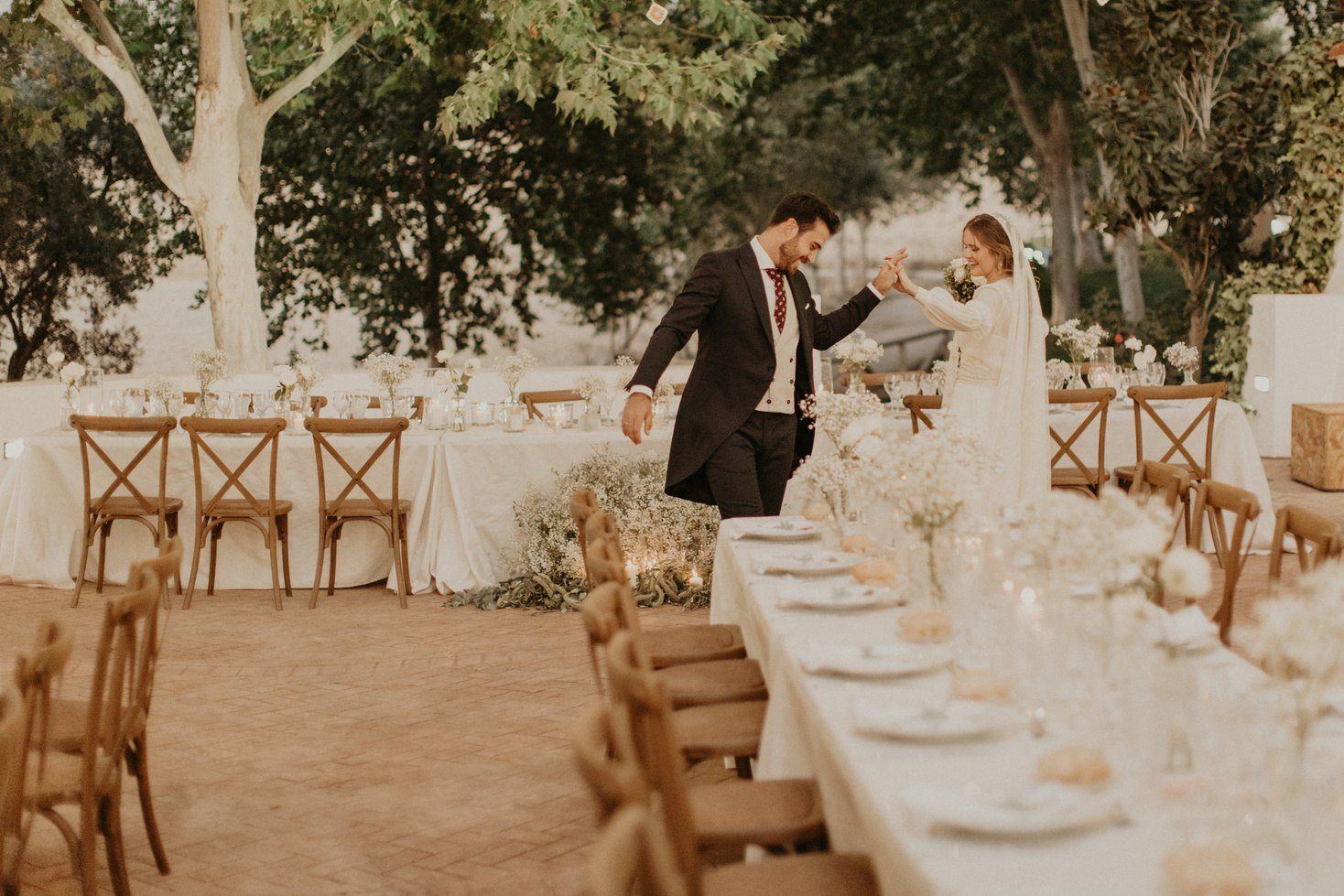 Couple dancing by the banquet table